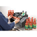DTM AP360e bottle label applicator in use with sauce bottles